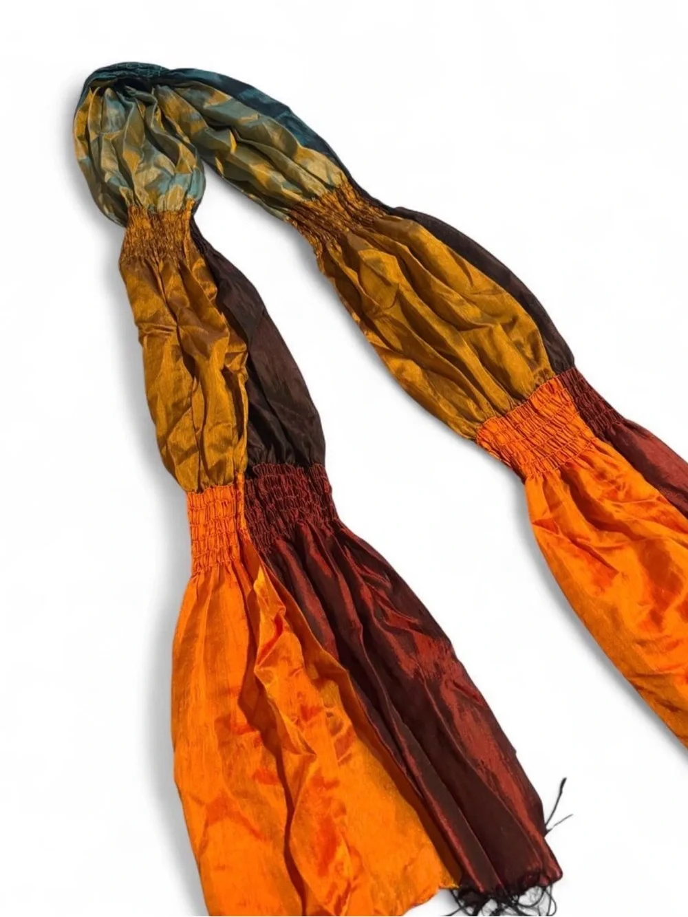 Orange, brown, and teal gradient silk scarf with fringe